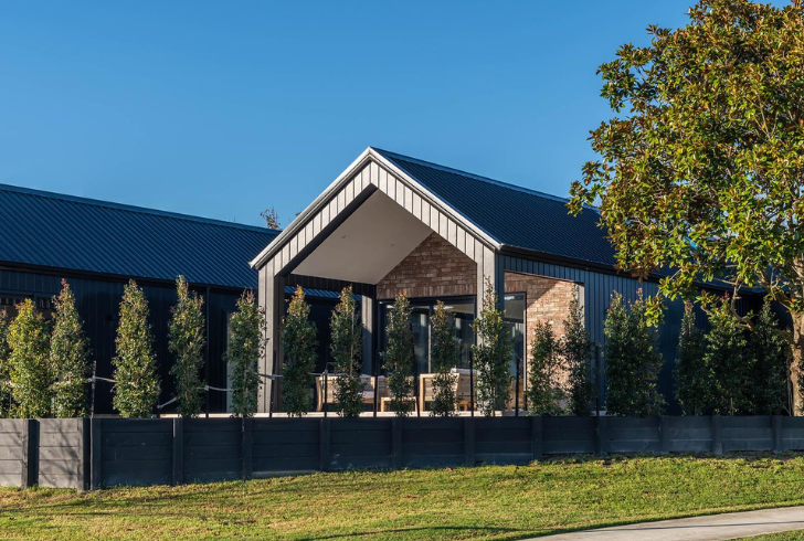 Each corner of the black brick house tells a story of architectural ingenuity and design excellence.
